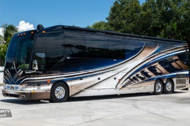 2023 Elegant Lady #891 exterior entry side front view of motorcoach on the lot
