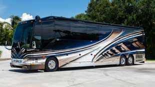 2023 Elegant Lady #891 exterior entry side front view of motorcoach on the lot