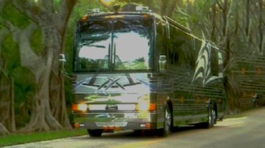 2003 Liberty Coach driving on road