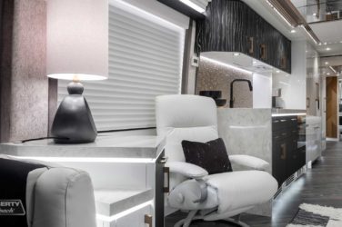 2023 Elegant Lady #892 motorcoach interior view of side chairs and table