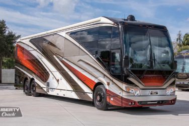 2023 Elegant Lady 896 exterior entry side front view of motorcoach on the lot