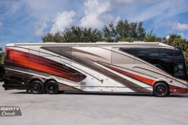 2023 Elegant Lady 896 exterior entry side view of motorcoach on the lot