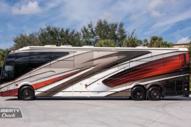 2023 Elegant Lady 896 exterior entry side view of motorcoach on the lot