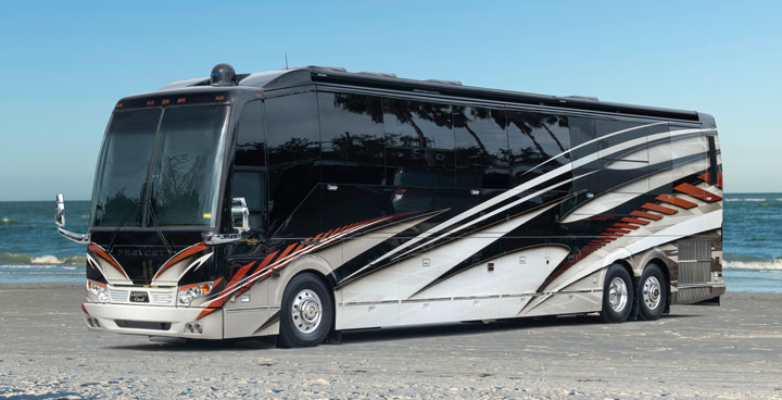 Elegant Lady motorcoach 897 parked on a beach