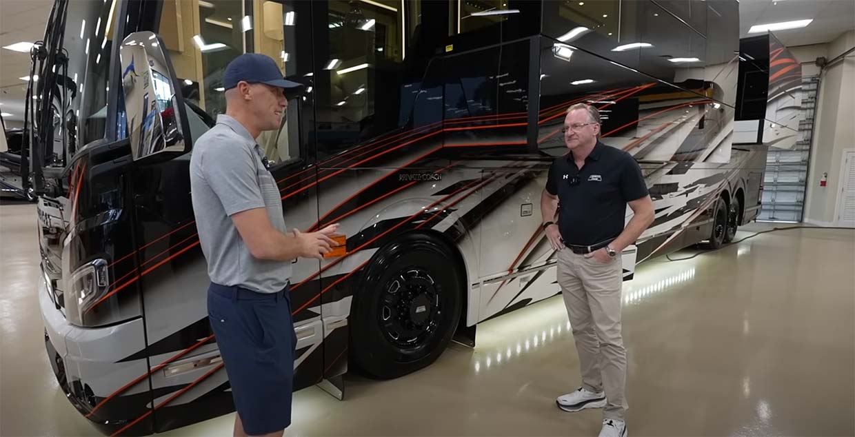 Andrew and Frank Konigseder standing in front of Coach #904