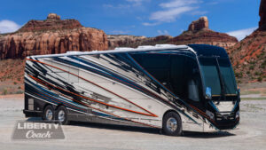 2024 Liberty Coach #909 exterior entry side view of motorcoach