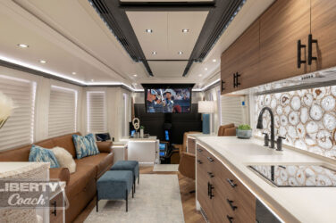 2024 Liberty Coach #909 motorcoach interior front look view of galley and dining area